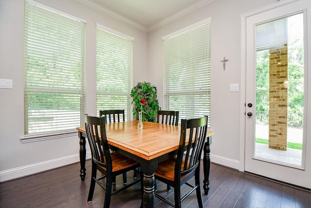 1704 Graystone Hills Dr, Conroe, TX 77304 - dining area featuring plenty of natural light, dark wood-style flooring, ornamental molding, and baseboards