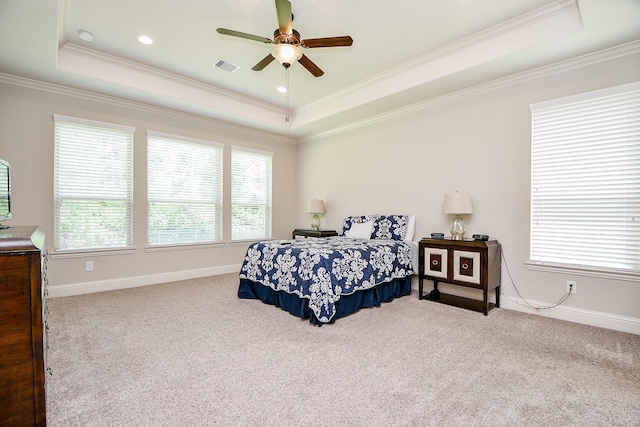 1704 Graystone Hills Dr, Conroe, TX 77304 - carpeted bedroom featuring a raised ceiling, ornamental molding, baseboards, and ceiling fan