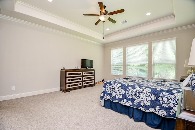 1704 Graystone Hills Dr, Conroe, TX 77304 - carpeted bedroom with a tray ceiling, ornamental molding, a ceiling fan, and baseboards