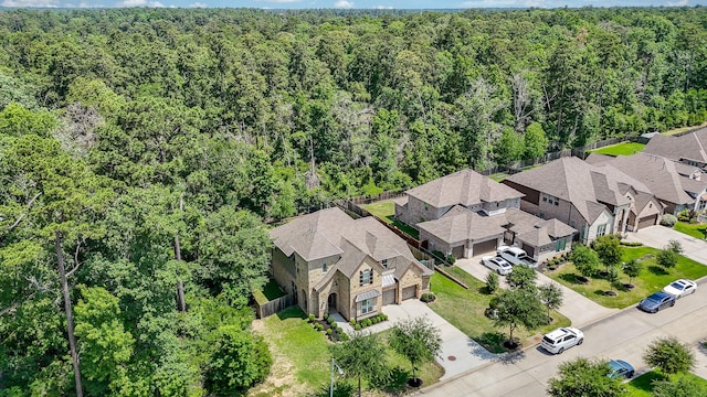 1704 Graystone Hills Dr, Conroe, TX 77304 - aerial perspective of suburban area with a heavily wooded area