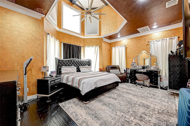 6121 County Road 225, Hungerford, TX 77448 - bedroom with ornamental molding, baseboards, wood finished floors, and a ceiling fan