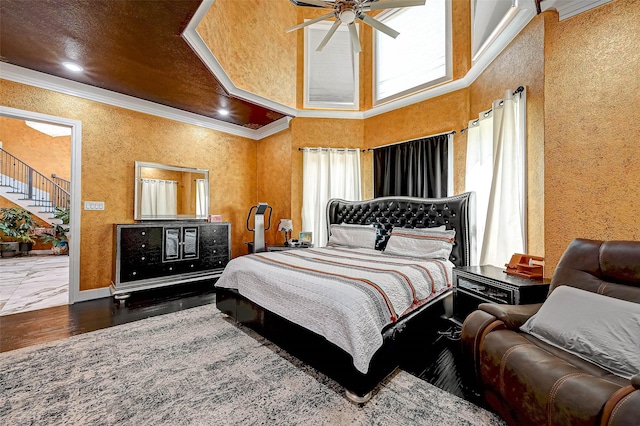 6121 County Road 225, Hungerford, TX 77448 - bedroom featuring crown molding, baseboards, and wood finished floors