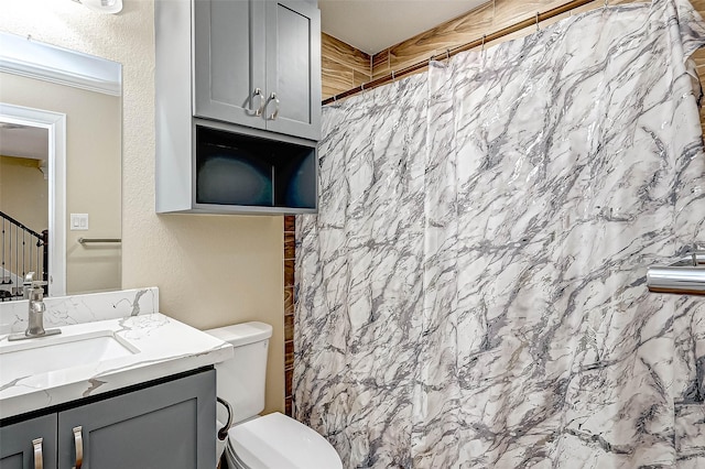 6121 County Road 225, Hungerford, TX 77448 - bathroom with vanity, toilet, and a shower with shower curtain