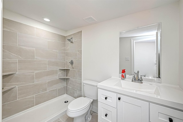 6121 County Road 225, Hungerford, TX 77448 - bathroom featuring toilet, vanity, and tiled shower