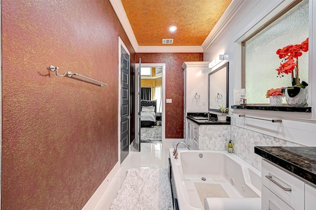 6121 County Road 225, Hungerford, TX 77448 - full bathroom with ornamental molding, a jetted tub, vanity, and ensuite bath