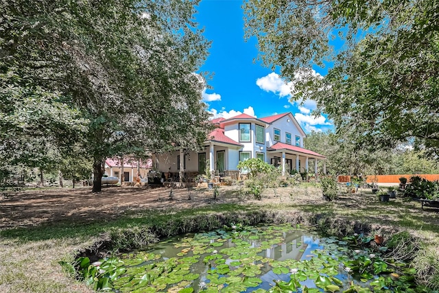 6121 County Road 225, Hungerford, TX 77448 - view of yard featuring a small pond