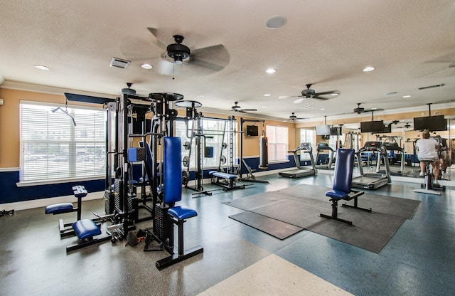 1711 Old Spanish Trl Unit 401, Houston, TX 77054 - gym with crown molding, a ceiling fan, recessed lighting, a textured ceiling, and baseboards