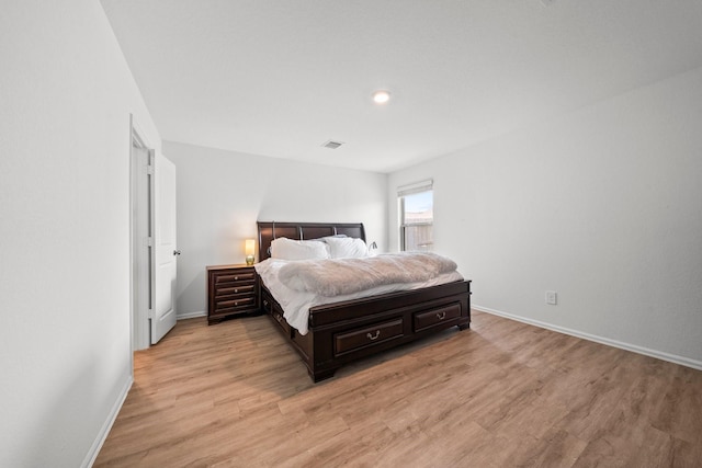 18107 Rockvine Dr, Hockley, TX 77447 - bedroom with baseboards, light wood finished floors, and recessed lighting