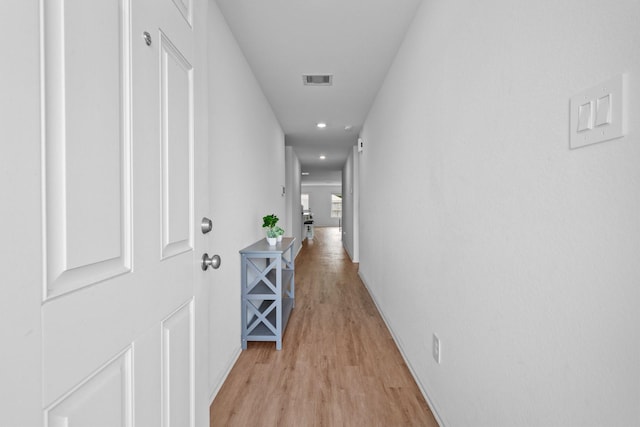 18107 Rockvine Dr, Hockley, TX 77447 - corridor featuring light wood-style flooring, recessed lighting, and baseboards