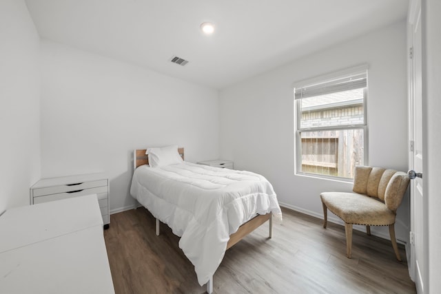 18107 Rockvine Dr, Hockley, TX 77447 - bedroom featuring wood finished floors and baseboards