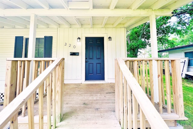 320 Azalea St, Lake Jackson, TX 77566 - property entrance with board and batten siding