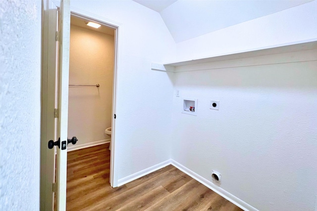 320 Azalea St, Lake Jackson, TX 77566 - washroom featuring wood finished floors, electric dryer hookup, washer hookup, and baseboards
