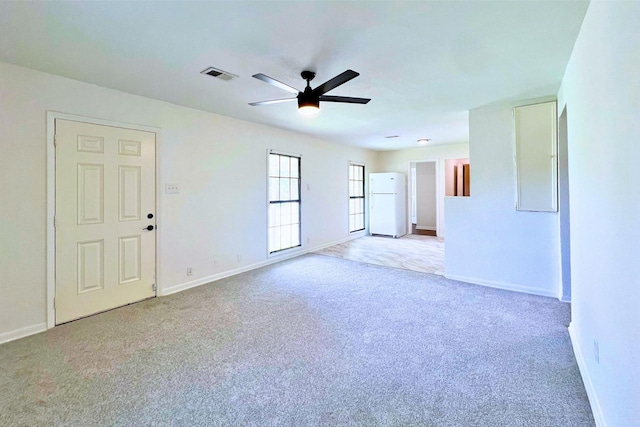 320 Azalea St, Lake Jackson, TX 77566 - empty room featuring a ceiling fan, carpet flooring, and baseboards