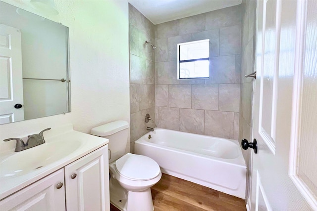 320 Azalea St, Lake Jackson, TX 77566 - full bathroom with toilet, vanity, wood finished floors, and shower / tub combination