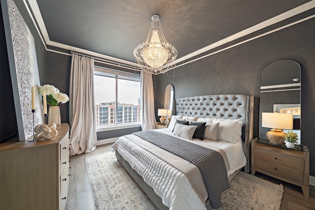 3333 Allen Pkwy Unit 1302, Houston, TX 77019 - bedroom with ornamental molding, a chandelier, and wood finished floors