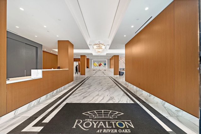 3333 Allen Pkwy Unit 1302, Houston, TX 77019 - hall with marble tiled flooring, a chandelier, recessed lighting, and inlaid floor details