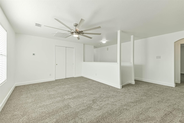 15503 Hickory Dale St, Cypress, TX 77429 - carpeted spare room with a ceiling fan, arched walkways, and baseboards