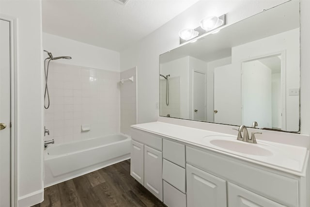 15503 Hickory Dale St, Cypress, TX 77429 - bathroom featuring vanity, shower / bath combination, and wood finished floors