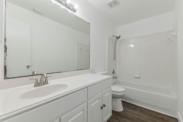 15503 Hickory Dale St, Cypress, TX 77429 - full bathroom featuring toilet, vanity, wood finished floors, and  shower combination