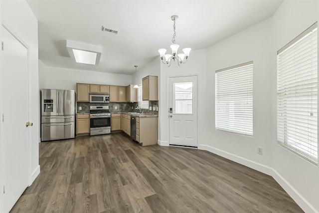 15503 Hickory Dale St, Cypress, TX 77429 - kitchen with stainless steel appliances, a sink, a chandelier, and dark wood-type flooring