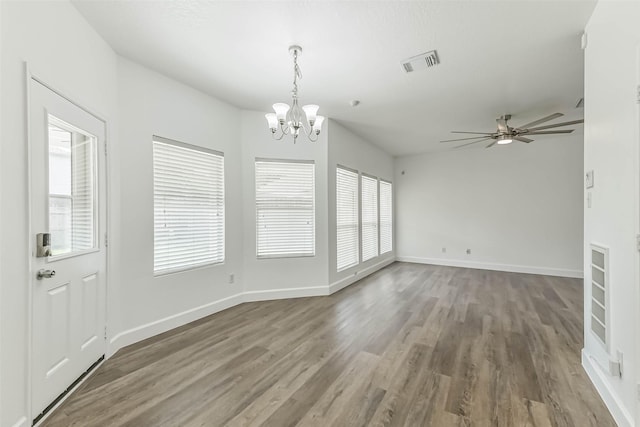 15503 Hickory Dale St, Cypress, TX 77429 - unfurnished dining area featuring a chandelier, wood finished floors, baseboards, and a ceiling fan