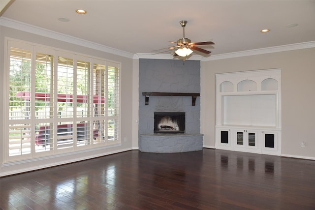 3314 Saint Charles Ct, Missouri City, TX 77459 - unfurnished living room featuring a ceiling fan, crown molding, wood finished floors, a fireplace, and baseboards