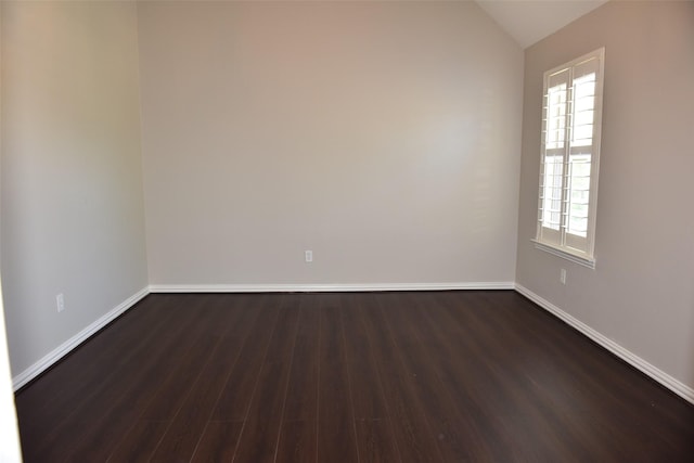 3314 Saint Charles Ct, Missouri City, TX 77459 - empty room featuring dark wood-style floors, baseboards, and vaulted ceiling