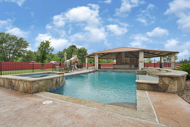 13635 Reeveston Rd, Houston, TX 77039 - view of pool featuring a gazebo, a pool with connected hot tub, and a patio