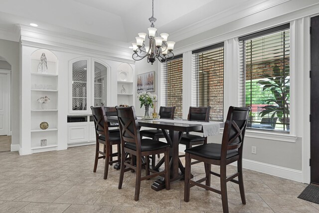 13635 Reeveston Rd, Houston, TX 77039 - dining room featuring built in features, ornamental molding, a chandelier, baseboards, and recessed lighting