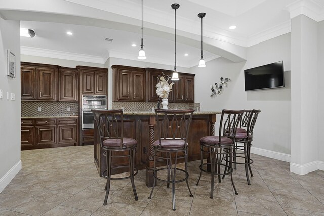 13635 Reeveston Rd, Houston, TX 77039 - kitchen featuring baseboards, ornamental molding, tasteful backsplash, recessed lighting, and stainless steel double oven