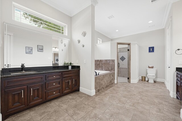 13635 Reeveston Rd, Houston, TX 77039 - bathroom featuring vanity, a garden tub, baseboards, a shower stall, and toilet