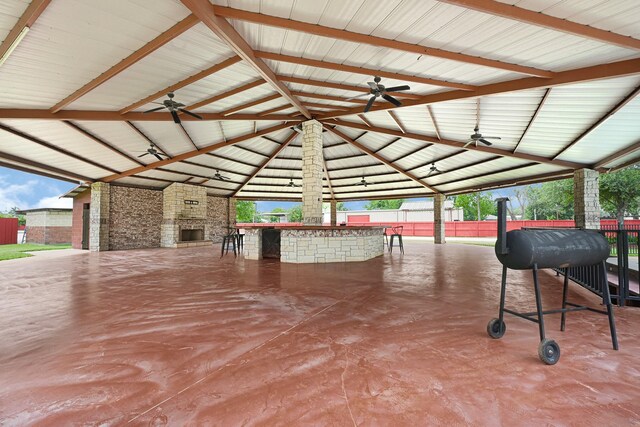 13635 Reeveston Rd, Houston, TX 77039 - view of patio featuring a ceiling fan and exterior bar