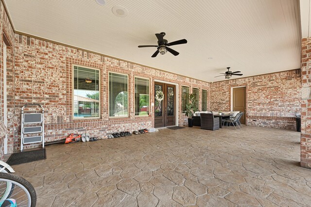 13635 Reeveston Rd, Houston, TX 77039 - view of patio / terrace with a ceiling fan, french doors, and outdoor dining area
