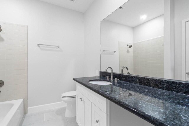 406 Wilcrest Dr Unit 406, Houston, TX 77042 - full bathroom with vanity, toilet, baseboards, and shower / bath combination