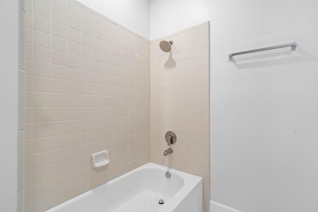 406 Wilcrest Dr Unit 406, Houston, TX 77042 - bathroom featuring  shower combination and baseboards