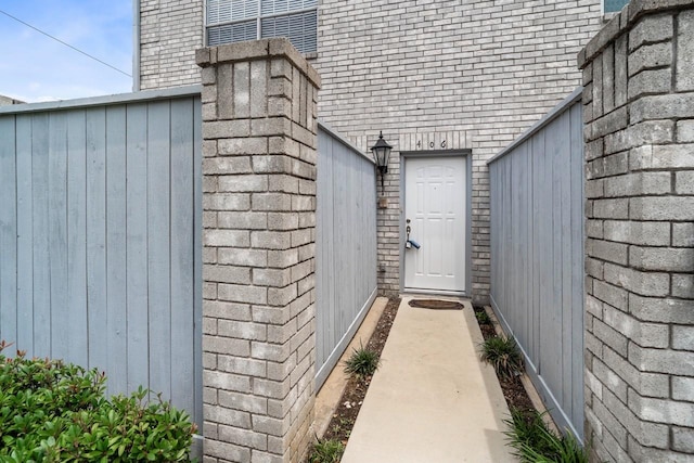 406 Wilcrest Dr Unit 406, Houston, TX 77042 - doorway to property featuring brick siding