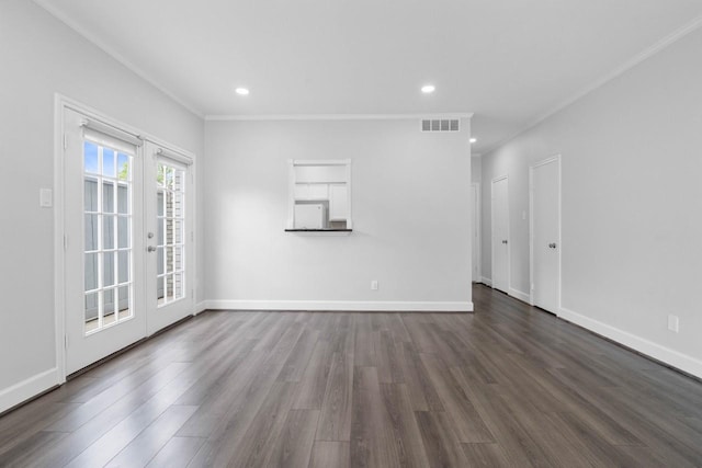 406 Wilcrest Dr Unit 406, Houston, TX 77042 - empty room with dark wood-type flooring, crown molding, recessed lighting, and baseboards