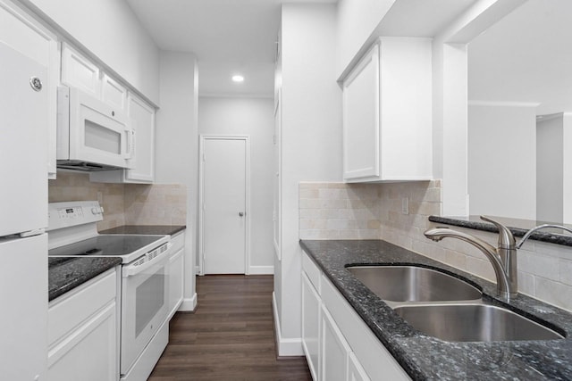406 Wilcrest Dr Unit 406, Houston, TX 77042 - kitchen with white appliances, a sink, dark stone counters, white cabinetry, and recessed lighting
