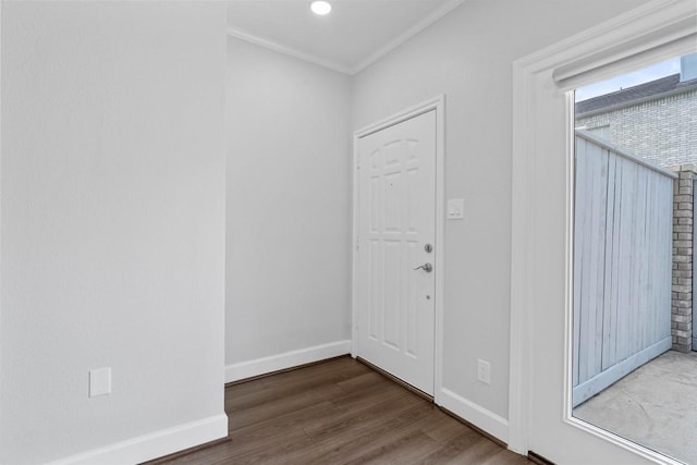 406 Wilcrest Dr Unit 406, Houston, TX 77042 - entrance foyer featuring wood finished floors, ornamental molding, and baseboards