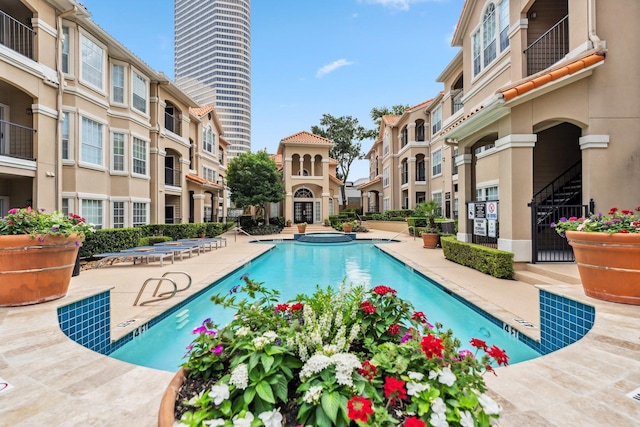 3231 Allen Pkwy Unit 4207, Houston, TX 77019 - community pool featuring a residential view