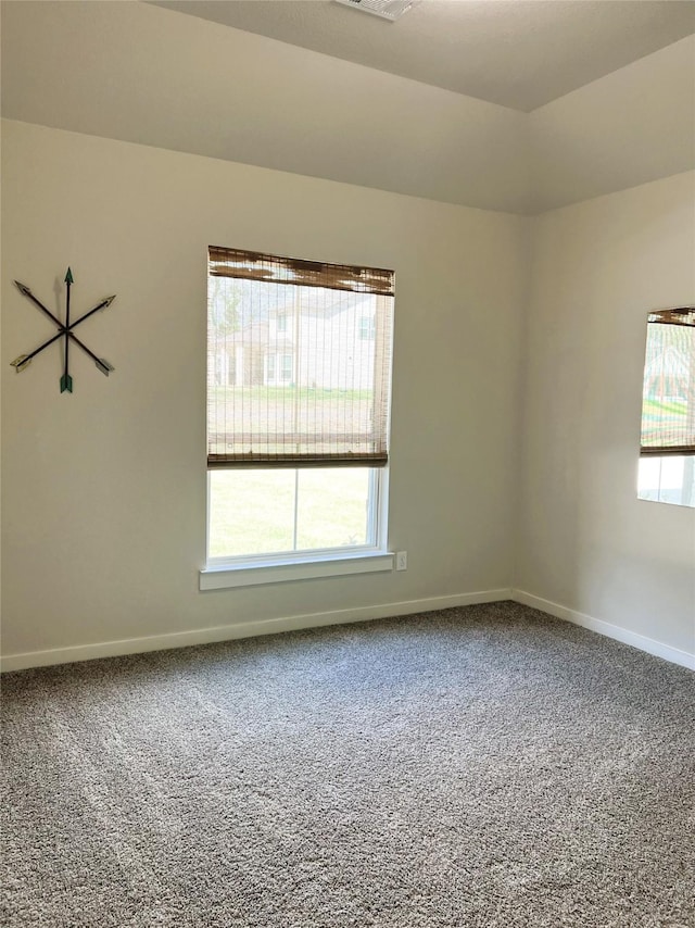 11755 Oakwood Ranch Dr, Willis, TX 77378 - carpeted empty room with baseboards
