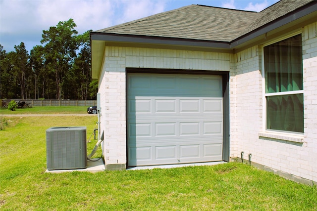 11755 Oakwood Ranch Dr, Willis, TX 77378 - garage featuring central air condition unit