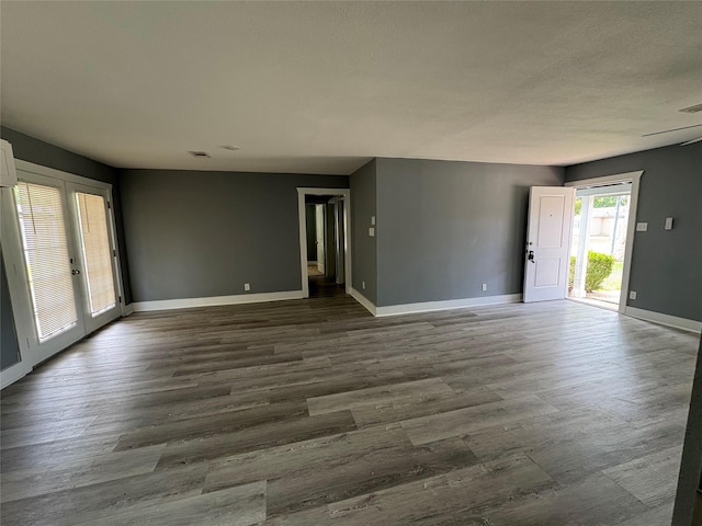5159 Dumore Dr, Houston, TX 77048 - unfurnished room with baseboards and dark wood finished floors