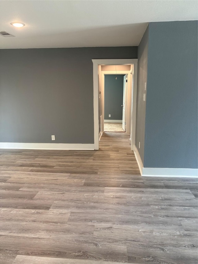 5159 Dumore Dr, Houston, TX 77048 - empty room with wood finished floors, baseboards, and recessed lighting