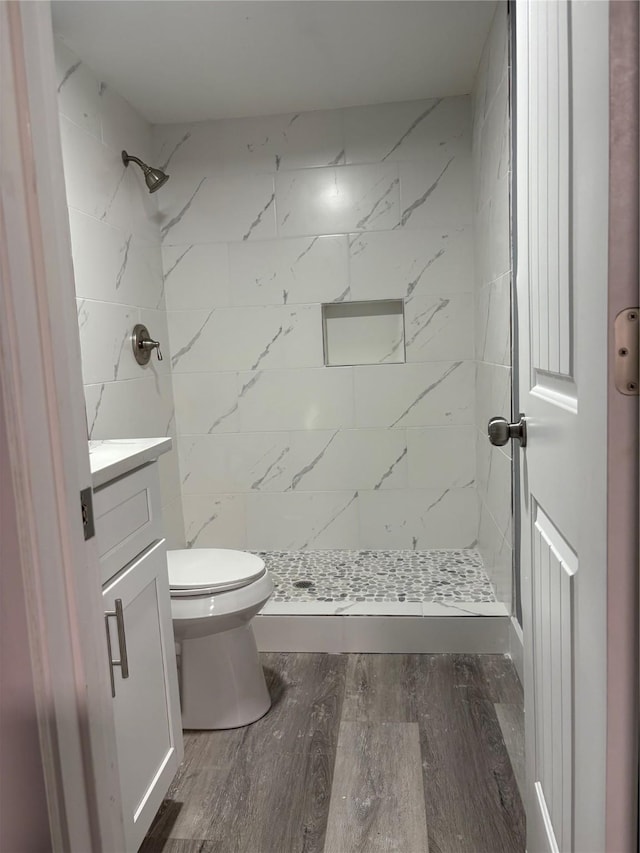 5159 Dumore Dr, Houston, TX 77048 - full bath with toilet, vanity, wood finished floors, and a shower stall
