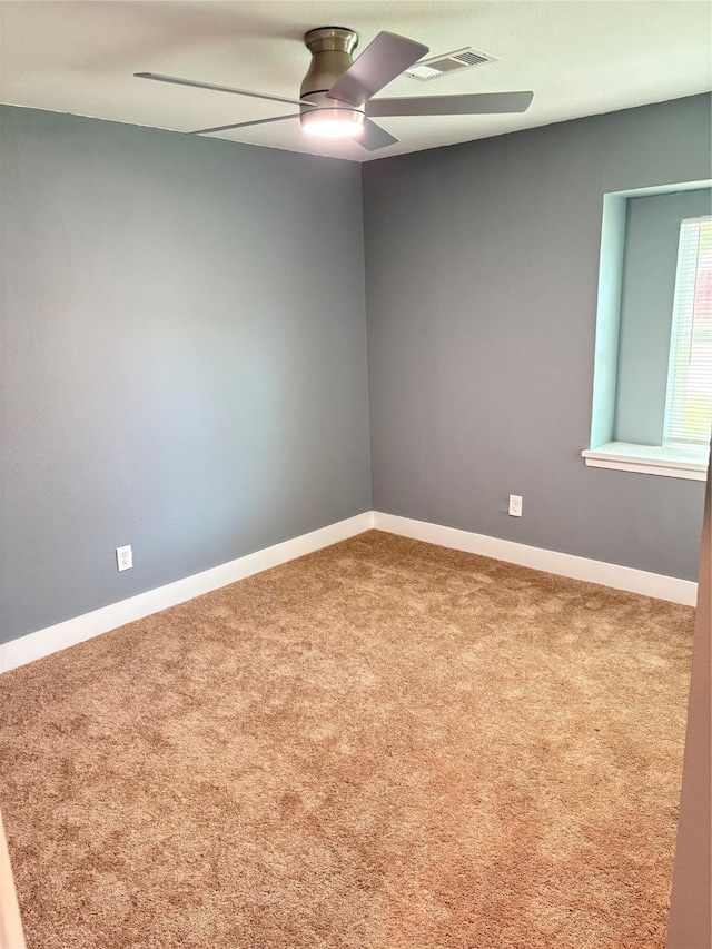 5159 Dumore Dr, Houston, TX 77048 - carpeted empty room featuring a ceiling fan and baseboards