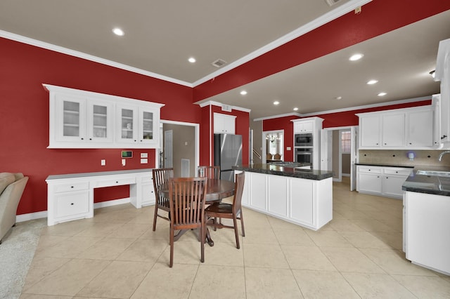 17114 Bur Oak Ct, Spring, TX 77379 - dining room with ornamental molding, light tile patterned floors, recessed lighting, and baseboards