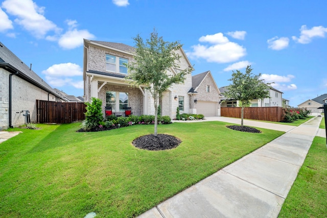 2310 Desert Holly Dr, Katy, TX 77493 - view of front of home with driveway, brick siding, an attached garage, and a residential view