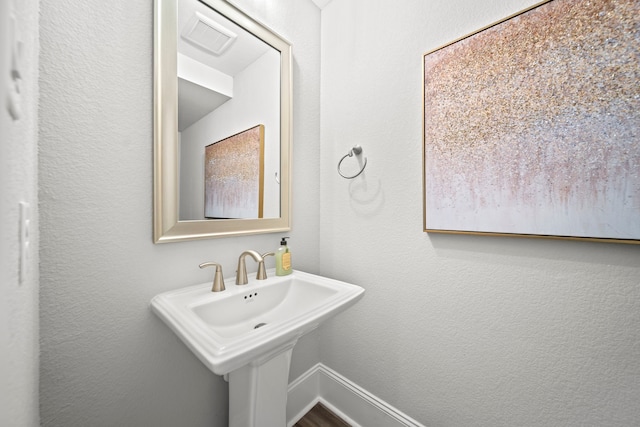 2310 Desert Holly Dr, Katy, TX 77493 - bathroom with a textured wall