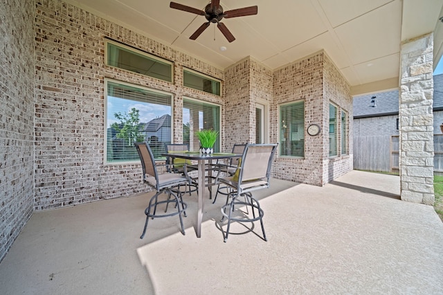 2310 Desert Holly Dr, Katy, TX 77493 - view of patio featuring a ceiling fan and outdoor dining space